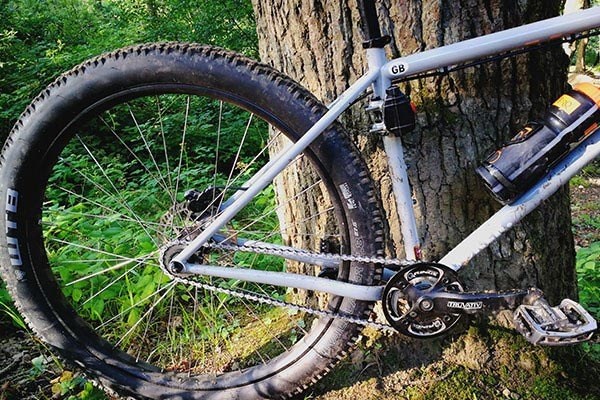 Angled shot of the Charge Cooker against a tree
